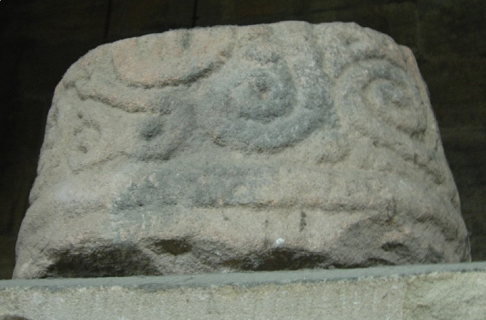 Part of a Saxon cross shaft to the rear of the Church, above a doorway in the North West corner. Spirals and curved motifs are visble on the outward facing side. An Anglo Saxon church once stood on the site. Also of interest is a 2,000 year old hollow yew tree to the North East of the original churchyard. If visiting in April, the triangular green to the west of the church is covered in daffodils,